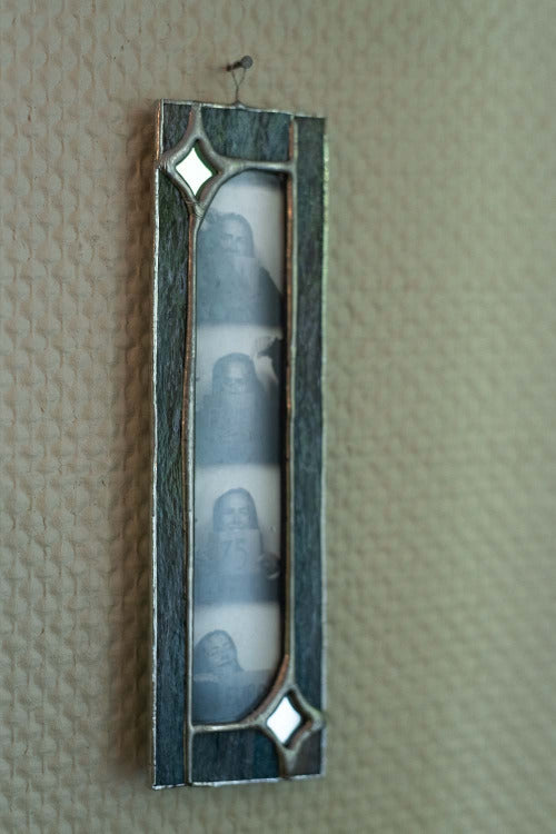 Decorative picture frame on a beige textured background